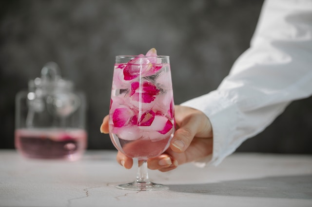 A glass filled with rose water